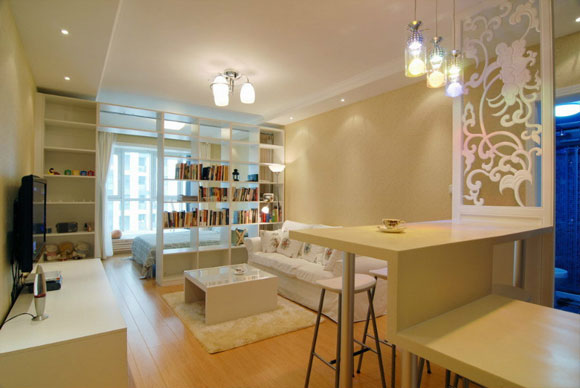 书柜隔出独立卧室,阳台装榻榻米,47㎡单身公寓装修很温暖!